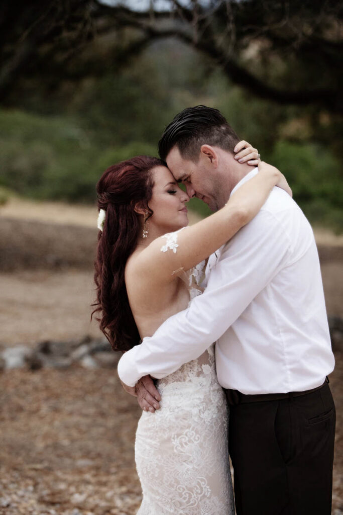 romantic pose of bride and groom