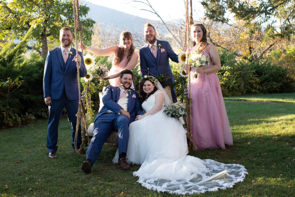 Bridal party on a swing