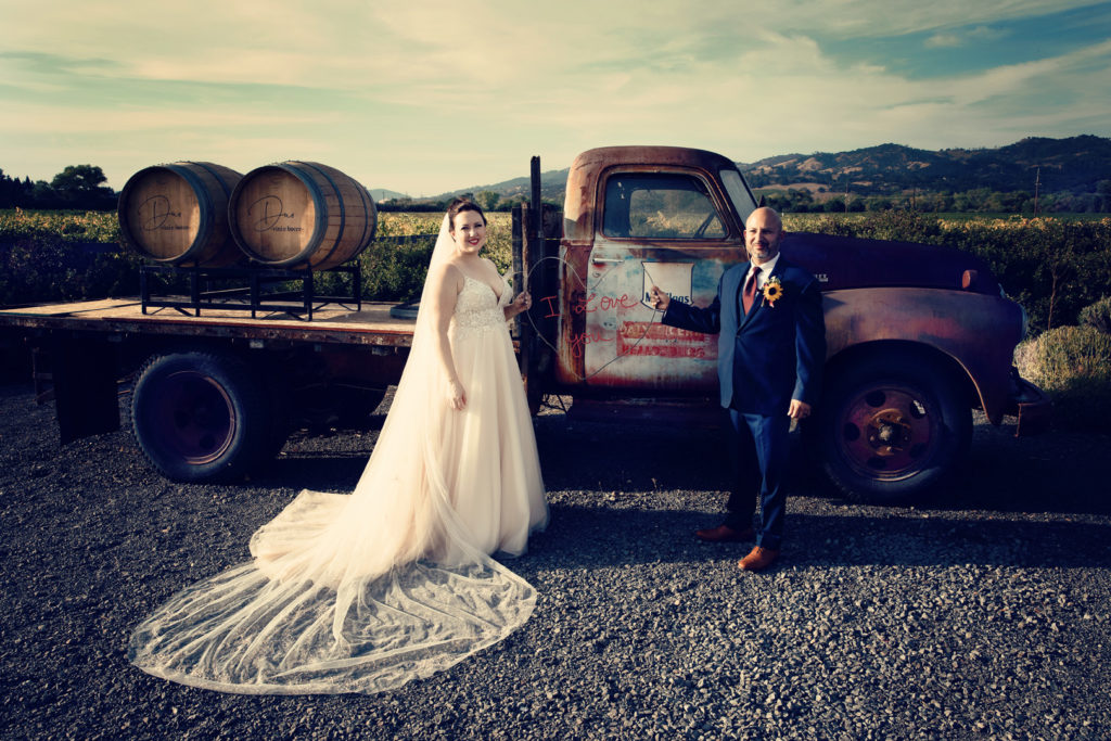 Bride & Groom with old vintage truck at Geyserville Inn