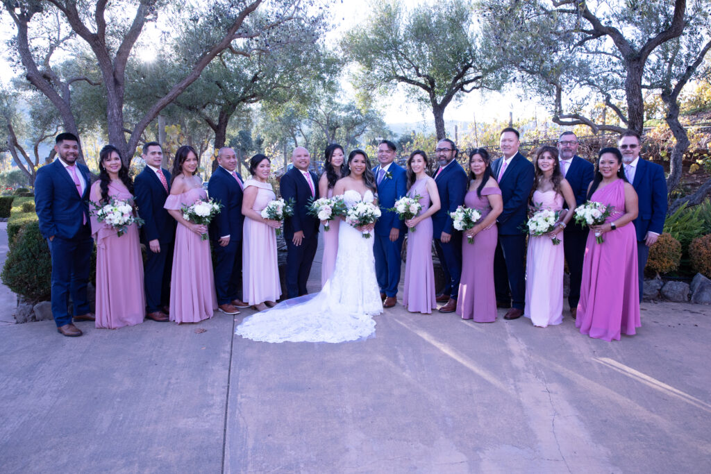 bridal party with pink dresses